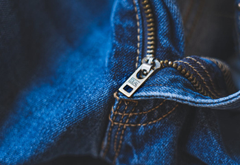 Why is metal zipper the first fashion choice for jeans?